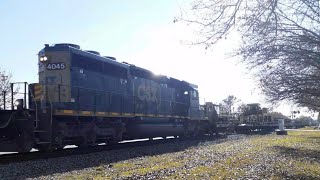 SD40-3 runs LHF bringing and loaded down rail train moving heading up North! dont know the ID