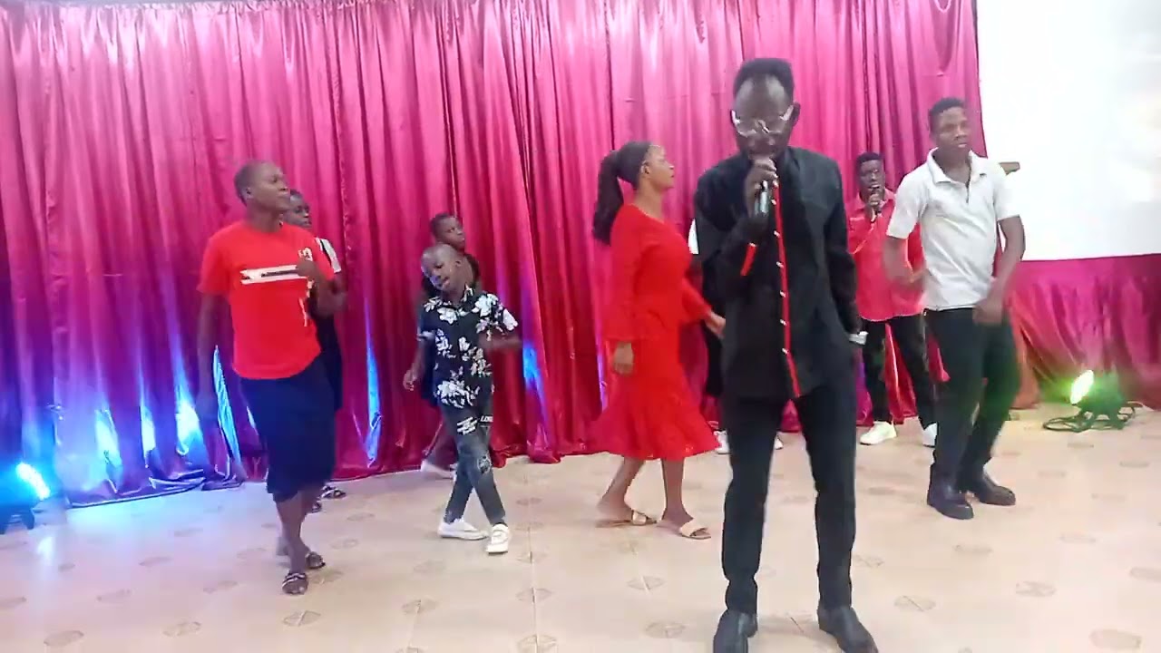 PRAISING THE MIGHTY BY MR. TENYWA MUSA 