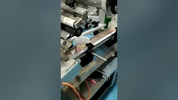 TOP AND ROUND LABELING MACHINE