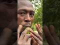 Surma tribe man whistles with fruit shorts omovalley ethiopia