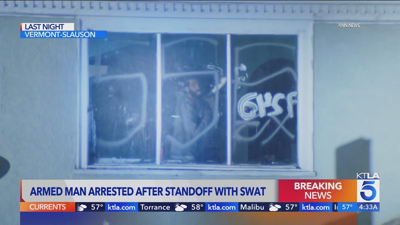 Armed man arrested after standoff with SWAT in L.A. neighborhood - YouTube
