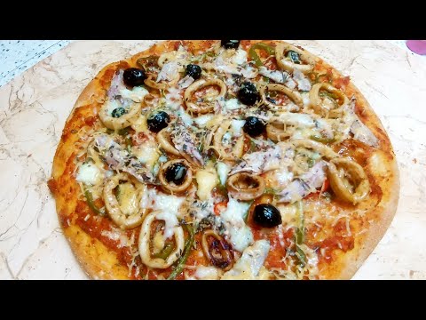 Vidéo: Pizza Aux Calamars