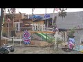 Gardener experiencing homelessness builds 'Hillside Estate' near freeway