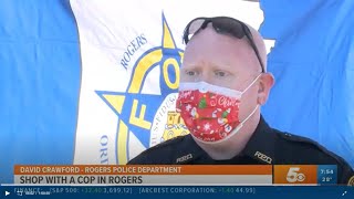 "Shop With a Cop" looked a little different in Rogers this year