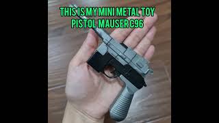 Gun, Pistol mauser c96, toy gun. Gun game.
