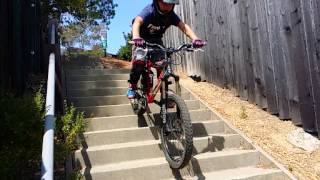 Vlad down hill flying stairs Kona 24" full suspens