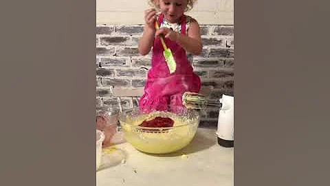 Three year old bakes a cake