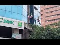 বহুতল ভবনের বাহির সাইডে সিলিকন লাগানো কাজ চলছে ইনশাআল্লাহ।