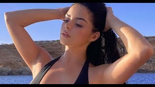 Demi Rose's boobs take centre stage as they threaten to escape from swimsuit