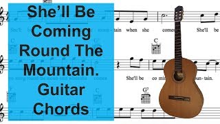 She'll Be Coming Round the mountain. Sing and play guitar with easy chords. Resimi
