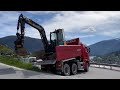 Volvo EC 58D unloading on SCANIA dumptruck
