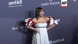 Charlize Theron, Naomi Campbell, Mark Ronson, Pansy Ho and Jackie Chan arrive at Hong Kong amfAR Gal screenshot 5