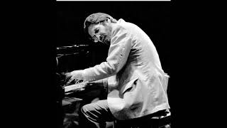 "Lucky To Be Me," a song by Leonard Bernstein as arranged for solo piano by Bill Evans