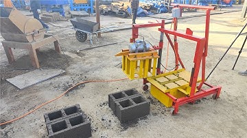 crawl mobile hole brick maker QM2-45 egg layer concrete building stones making machine #business