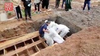 Remains of 9 family members buried in common grave