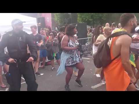 Notting Hill Carnival - Candy Dance with Police Officer