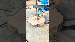 Flattening large tree stump surface using router jig assembly