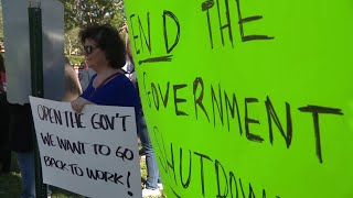 Federal workers hold protest outside IRS office in Plantation