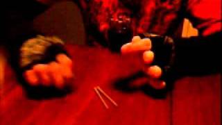 Criss Angels spikes through Coin trick