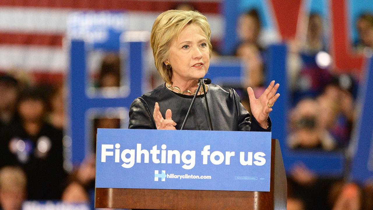 Closing Bell: Wall Street Endures Volatile End After FBI Reopens Clinton Case