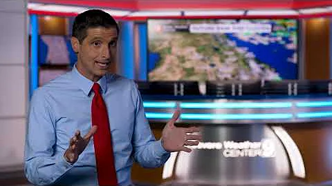 Channel 9 Meteorologist Brian Shields helps prepar...