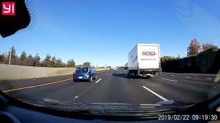 Carpool cheater exits lane after seeing cop