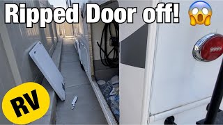 Damaged RV cargo Door | Make sure doors are locked and closed before moving!