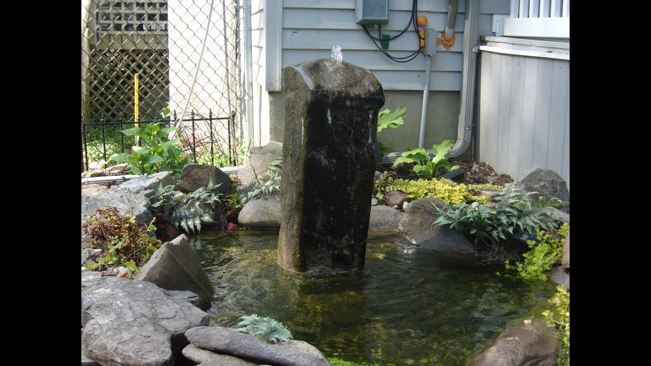 (HOW TO MAKE YOUR OWN ROCK WATER FOUNTAIN FOR PONDS AND WATER FEATURES)