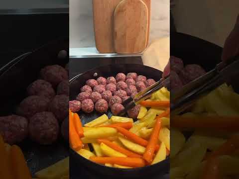 Meatballs with Potatoes and Carrots from the Oven, Turkish Bulgur Rice, and Salad with Red Cabbage