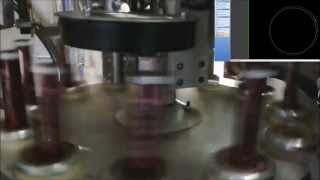 Control de concentricidad en envases cosméticos