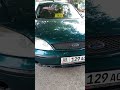В Кара-Балте таксисты-частники захватили тротуар и превратили его в парковку