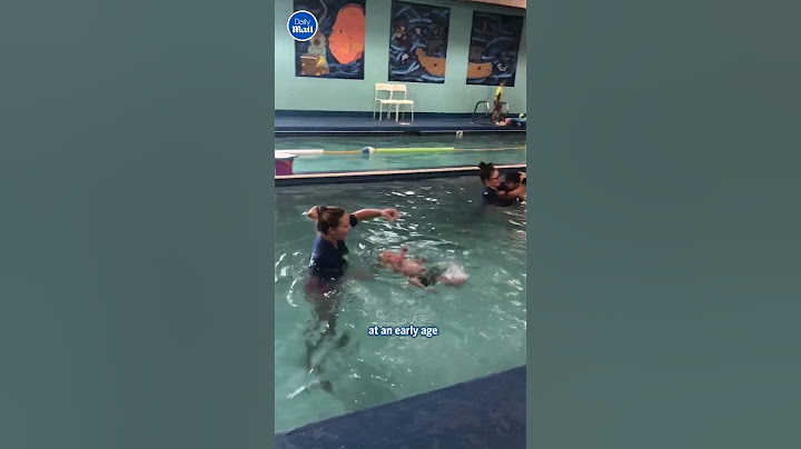 Instructor throws baby in pool for swim lesson 😳