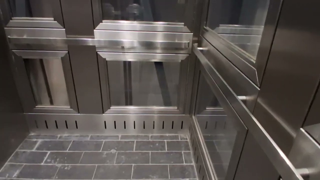 Mongrain hydraulic glass elevator at the MTA MNRR White Plains station (White Plains, NY)