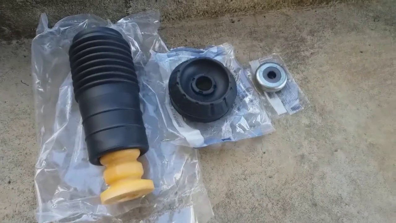 Nissan Versa - Troca coxim amortecedor