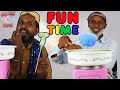 Tribal People Play With a Cotton Candy Maker