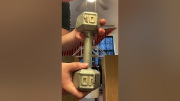 Statics Bridge Project: Testing of a Howe Truss Popsicle Stick Bridge.