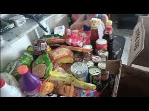 unboxing mini grocery with Caleb