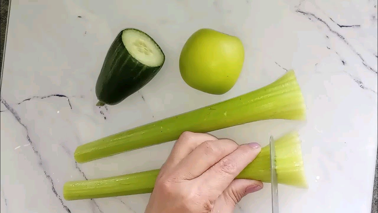 Chopping celery cucumber and apple