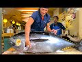 japanese food - bluefin tuna cutting show in tokyo (reupload)