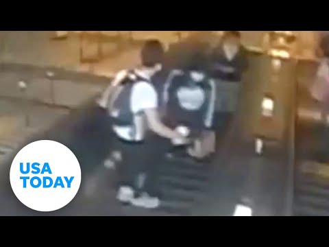 NYPD looking for man caught on video kicking a woman down an escalator | USA TODAY