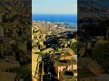Vertical video. Genoa, Italy. Central part of the city, aerial view. Ships in the port. Aerial Vi...