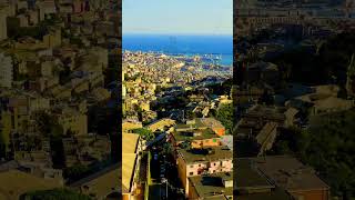 Vertical video. Genoa, Italy. Central part of the city, aerial view. Ships in the port. Aerial Vi...