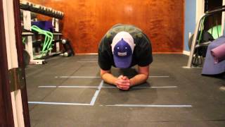 Plank with alternating lateral step