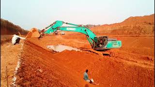 canal slope cutting (canal excavation by kobelco 380 excavator operating by very talented operator.