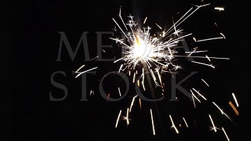 Firework sparkler burning in macro shot