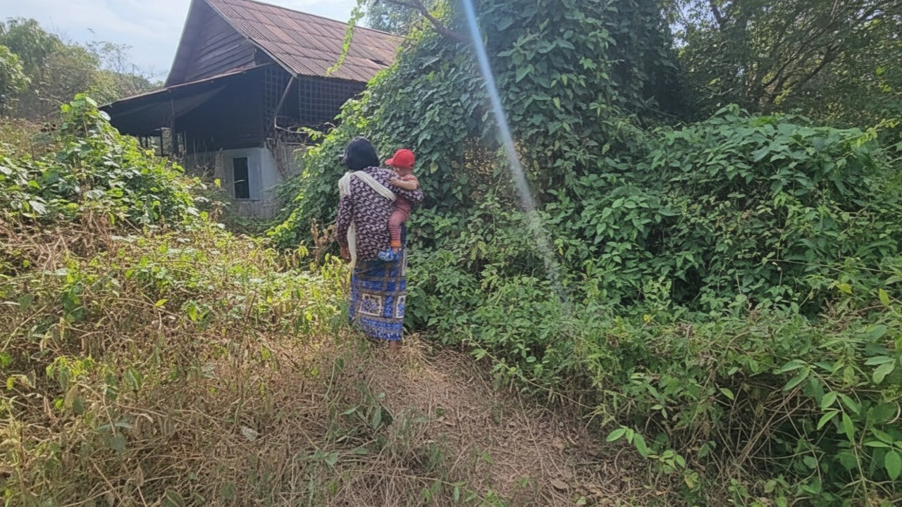 She Returned to Her Abandoned Home… Holding the Future in Her Arms.