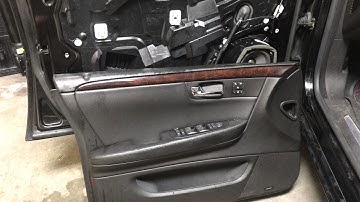 How to remove front door panels on a Cadillac DTS