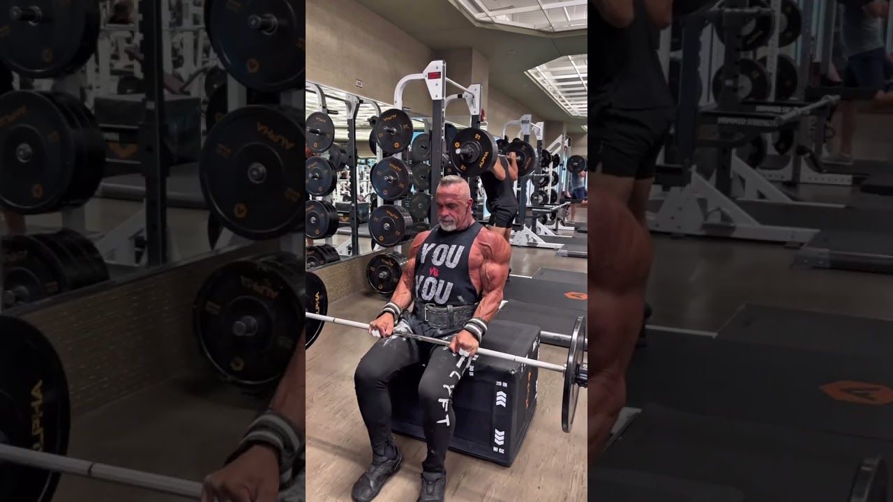 Seated reverse barbell curls are a great and safe way to work your forearms and biceps simultaneous.