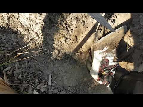 Digging earth with cowboy boots (2)- by Mila