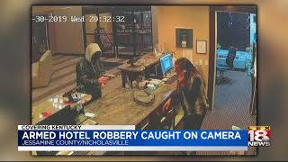 Armed hotel robbery caught on camera